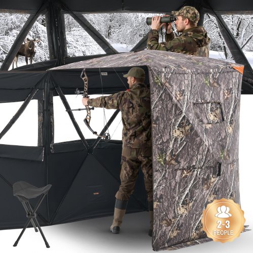

VEVOR Persiana de Caza Térmica 2 o 3 Personas con Silla de Tres Patas y Bolsa de Transporte, Camuflaje, con Puerta y Ventana Silenciosas con Cremallera, a Pavos y Ciervos, 1480 x 1480 x 2000 mm
